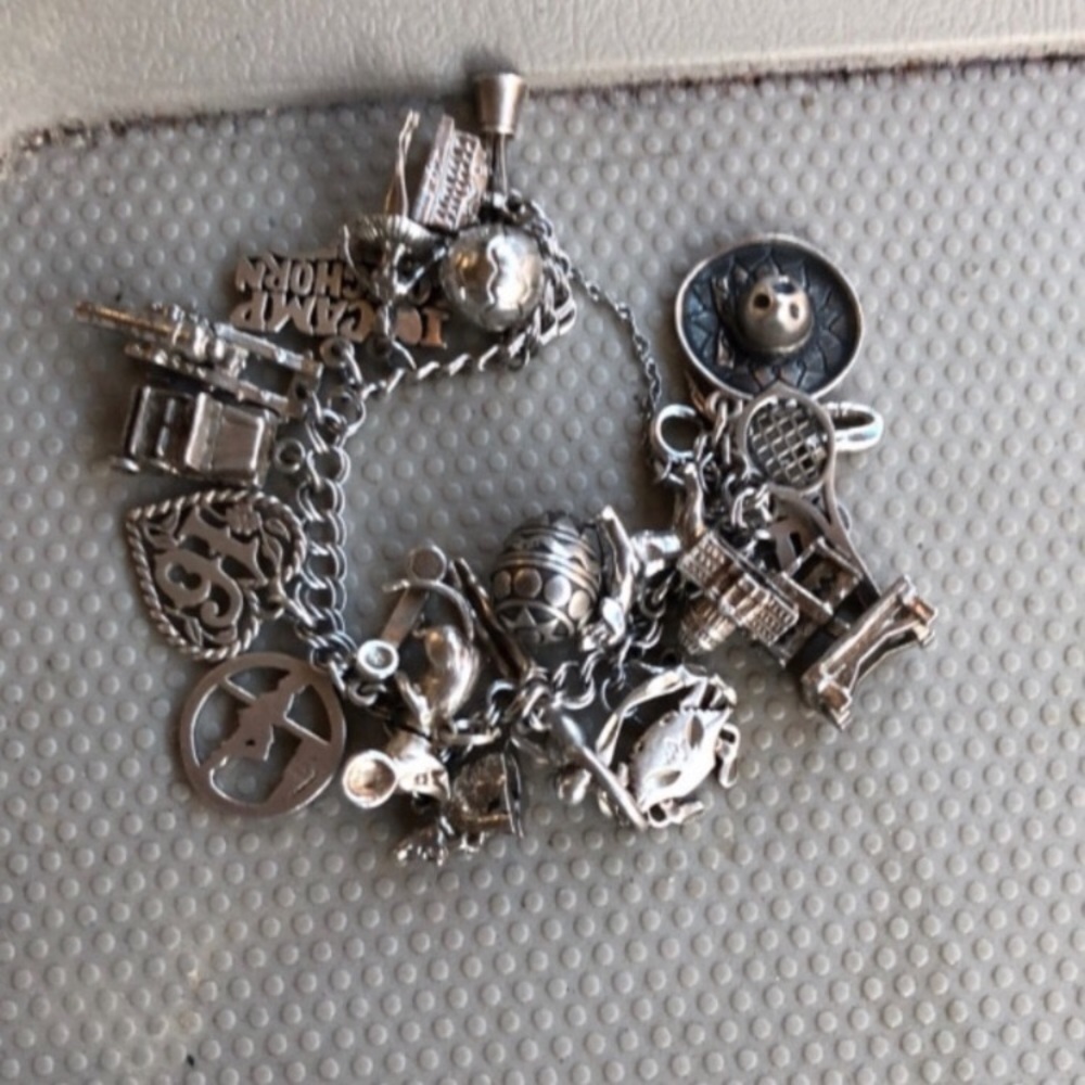 Sold charm bracelet for $300...closing shop HEARME